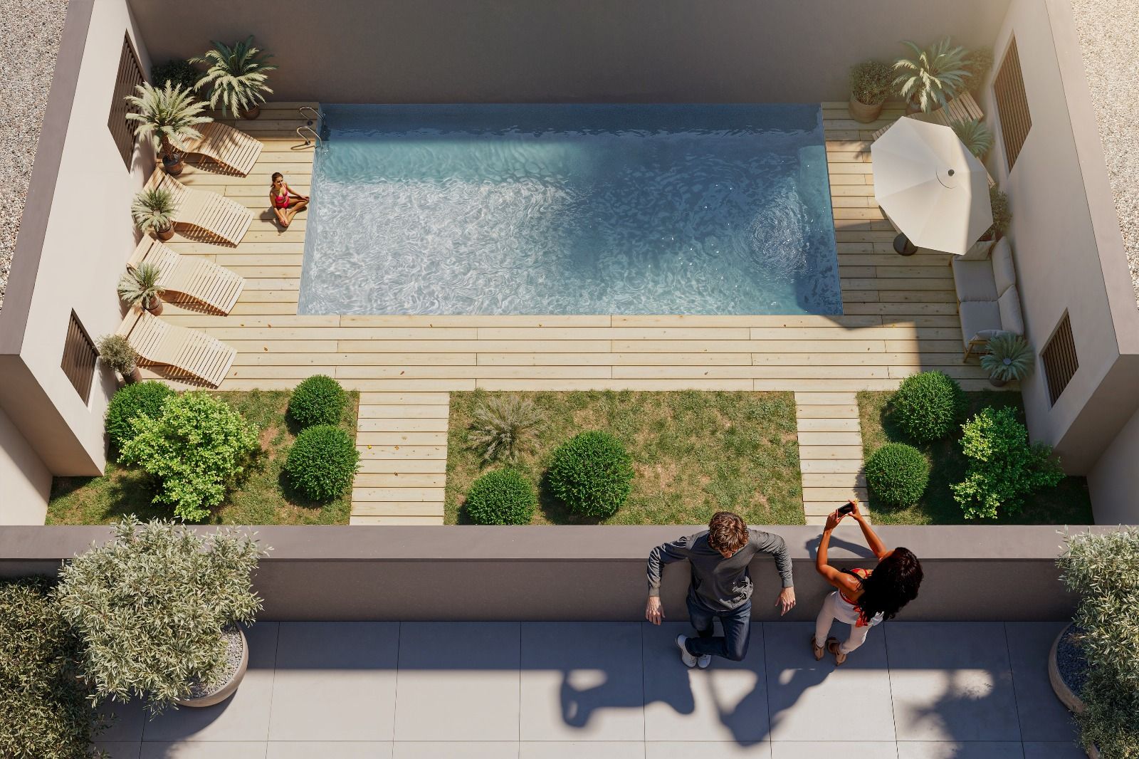 Vista elevada de la piscina y zona comunitaria de Residencial Soler i Diffent